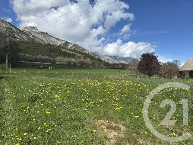 Afficher la photo en grand terrain à vendre - 1245.0 m2 - LE NOYER - 05 - PROVENCE-ALPES-COTE-D-AZUR - Century 21 Interalpes